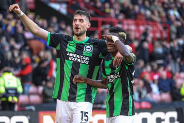 Brighton & Hove Albion 'dan Simon Adingra, 18 Şubat 202' de Bramall Lane, Sheffield, İngiltere 'de oynanan Premier League maçı Sheffield United ve Hove Albion maçında 0-5' lik galibiyet golünü kutluyor.