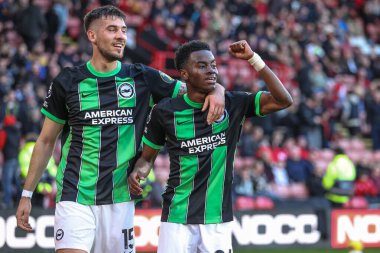 Brighton & Hove Albion 'dan Simon Adingra, 18 Şubat 202' de Bramall Lane, Sheffield, İngiltere 'de oynanan Premier League maçı Sheffield United ve Hove Albion maçında 0-5' lik galibiyet golünü kutluyor.