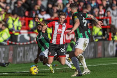 Brighton & Hove Albion takımından Tariq Lamptey, Sheffield United ile Bramall Lane, Sheffield, İngiltere 'de oynanan Premier League maçı sırasında James McAtee' ye faul yaptı.