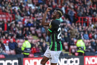 Brighton & Hove Albion 'dan Simon Adingra, 18 Şubat 202' de Bramall Lane, Sheffield, İngiltere 'de oynanan Premier League maçı Sheffield United ve Hove Albion maçında 0-5' lik galibiyet golünü kutluyor.