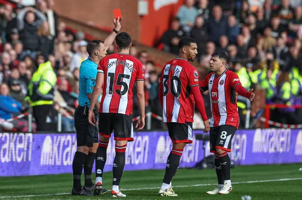 stock image Referee Stuart Attwell gives a red card to Mason Holgate of Sheffield United during the Premier League match Sheffield United vs Brighton and Hove Albion at Bramall Lane, Sheffield, United Kingdom, 18th February 202