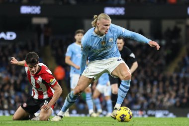 Manchester City 'den Erling Hland, 20 Şubat 2024 tarihinde Etihad Stadyumu' nda Manchester City ile Brentford arasında oynanan Premier League karşılaşmasında bölgenin sınırında mola verdi.