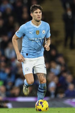 Manchester City 'den John Stones 20 Şubat 202' de Etihad Stadyumu 'nda Manchester City' nin Brentford 'a karşı oynadığı Premier Lig maçında topu aldı.