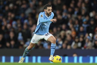 Manchester City 'den Bernardo Silva, 20 Şubat 202' de Etihad Stadyumu 'nda Manchester City ile Brentford arasındaki Premier League maçında topu aldı.