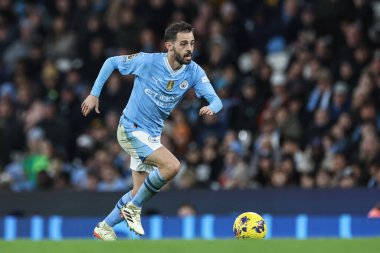 Manchester City 'den Bernardo Silva, 20 Şubat 202' de Etihad Stadyumu 'nda Manchester City ile Brentford arasındaki Premier League maçında topu aldı.