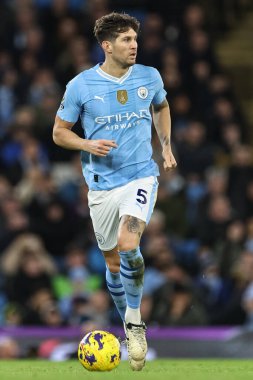 Manchester City 'den John Stones 20 Şubat 202' de Etihad Stadyumu 'nda Manchester City' nin Brentford 'a karşı oynadığı Premier Lig maçında topu aldı.