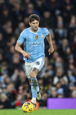 Manchester City 'den John Stones 20 Şubat 202' de Etihad Stadyumu 'nda Manchester City' nin Brentford 'a karşı oynadığı Premier Lig maçında topu aldı.