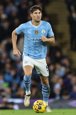 Manchester City 'den John Stones 20 Şubat 202' de Etihad Stadyumu 'nda Manchester City' nin Brentford 'a karşı oynadığı Premier Lig maçında topu aldı.