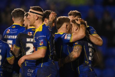 Warrington Wolves 'tan Sam Powell, 23 Şubat 202' de İngiltere 'nin Warrington kentinde oynanan Betfred Süper Lig karşılaşmasında Warrington Wolves' a karşı Hull FC karşılaşmasını kutluyor.