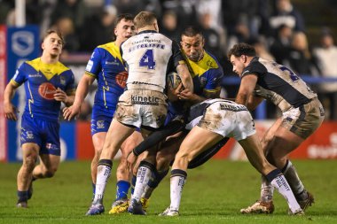 Warrington Wolves 'dan Paul Vaughan, 23 Şubat 202' de Halliwell Jones Stadyumu 'nda oynanan Betfred Süper Lig karşılaşmasında Charlie Severs Hull FC ve Liam Sutcliffe Hull FC tarafından yenildi.