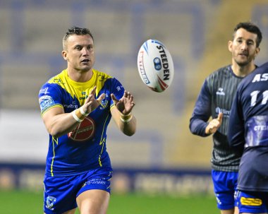 Warrington Wolves takımının oyuncusu Josh Drinkwater, maç öncesi ısınma turunda, 23 Şubat 202 tarihinde Warrington 'da oynanan Betfred Süper Lig karşılaşmasında Warrington Wolves vs Hull FC' ye karşı Halliwell Jones Stadyumu, Warrington, İngiltere