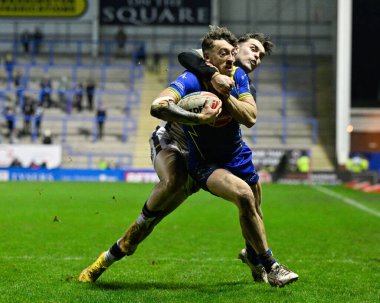 Warrington Wolves Lisesi 'nden Matty Ashton, 23 Şubat 202' de İngiltere 'nin Warrington kentinde oynanan Betfred Süper Lig karşılaşmasında Hull FC' den Tex Hoy tarafından yenildi.