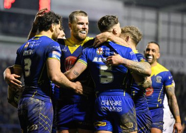 Warrington Wolves 'tan Toby King, 23 Şubat 202' de Warrington, Warrington 'da oynanan Betfred Süper Lig 2. Raundunda Warrington Wolves vs Hull FC maçında 26-10 Warrington' a ulaşma çabasını kutluyor.