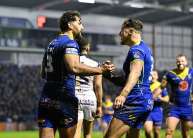 Warrington Wolves 'tan Toby King, 23 Şubat 202' de Warrington, Warrington 'da oynanan Betfred Süper Lig 2. Raundunda Warrington Wolves vs Hull FC maçında 26-10 Warrington' a ulaşma çabasını kutluyor.