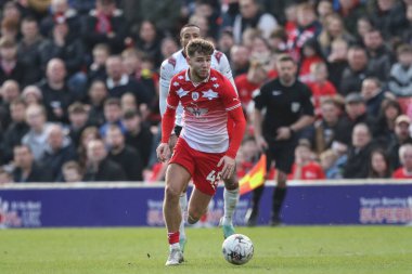 Barnsley 'den John Mcatee, 24 Şubat 202' de Oakwell, Barnsley, İngiltere 'de oynanan Sky Bet Ligi 1 karşılaşmasında topu bırakıyor.