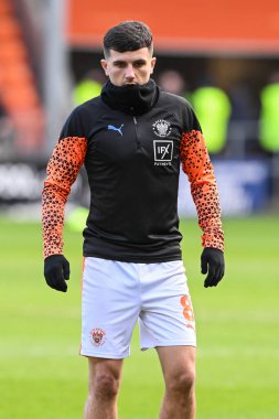 Blackpool takımından Albie Morgan 24 Şubat 202 'de Bloomfield Road, Blackpool' da oynanan Blackpool-Bolton Wanderers maçında oynanan maç öncesi ısınma maçında