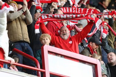 Barnsley taraftarları 24 Şubat 202 'de Oakwell, Barnsley, İngiltere' de oynanan Sky Bet 1 maçında 2-1 'lik galibiyeti kutluyorlar.