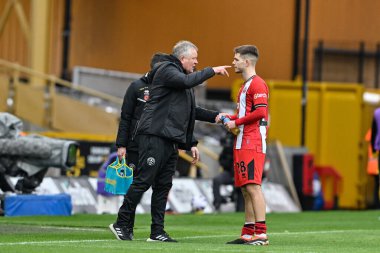 Chris Wilder manager of Sheffield United gives instructions to James McAtee of Sheffield United during the Premier League match Wolverhampton Wanderers vs Sheffield United at Molineux, Wolverhampton, United Kingdom, 25th February 202