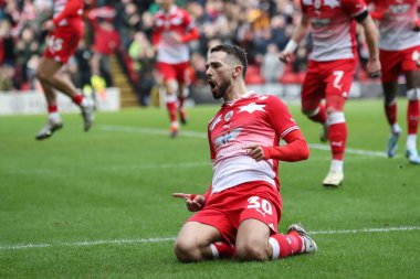 Barnsley 'den Adam Phillips 24 Şubat 202' de Oakwell, Barnsley, İngiltere 'de oynanan Sky Bet Lig 1 karşılaşmasında 1-1 kazanma hedefini kutluyor.