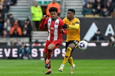 Wolverhampton Wanderers takımından Nlson Semedo, Sheffield United takımının oyuncusu Rhian Brewster 'a karşı oynanan Premier League maçında faul yaptı: Wolverhampton Wanderers - Sheffield United, Molineux, Wolverhampton, Birleşik Krallık, 25 Şubat 202 