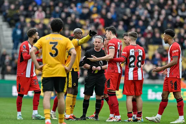 Players Surround Referee Darren Bond Premier League Match Wolverhampton Wanderers Stock Picture