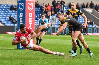 Salford Red Devils takımından Nene Macdonald, 25 Şubat 202 'de İngiltere' nin Salford Community Stadyumu 'nda oynanan Betfred Süper Lig karşılaşmasında attığı golle Salford Red Devils - Castleford Tigers maçında gol attı.
