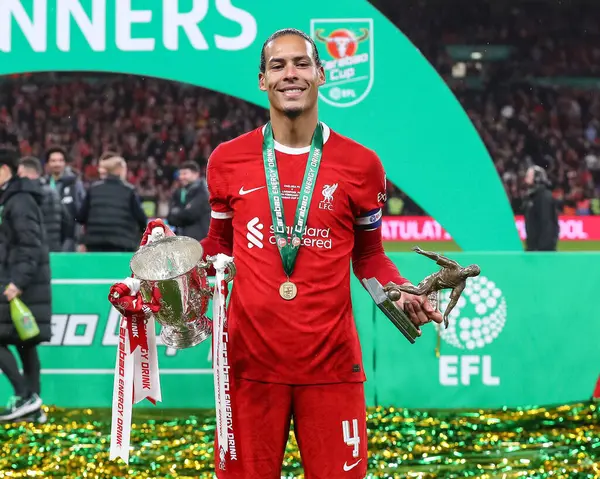 stock image Virgil van Dijk of Liverpool with the Carabao Cup during the Carabao Cup Final match Chelsea vs Liverpool at Wembley Stadium, London, United Kingdom, 25th February 202