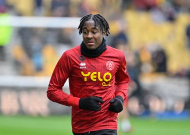 Sheffield United takımından Andre Brooks, Premier League maçında Wolverhampton Wanderers - Sheffield United maçında Molineux, Wolverhampton, İngiltere 'de 25 Şubat 202' de ısındı.