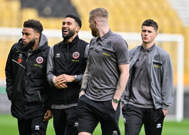Sheffield United takımından Jayden Bogle, Premier League maçında Wolverhampton Wanderers 'a karşı Molineux, Wolverhampton, Birleşik Krallık' ta 25 Şubat 202 'de oynanan maçta sahada bir espri paylaşıyor.