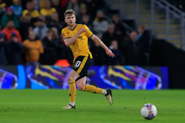 stock image Tommy Doyle of Wolverhampton Wanderers passes the ball during the Emirates FA Cup 5th Round match Wolverhampton Wanderers vs Brighton and Hove Albion at Molineux, Wolverhampton, United Kingdom, 28th February 202