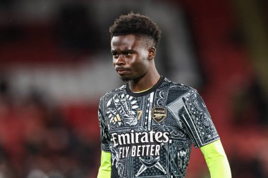 Arsenal 'den Bukayo Saka Premier Lig maçı öncesinde Bramall Lane, Sheffield, İngiltere' de Sheffield United 'a karşı 4 Mart 202' de oynanan maç öncesi ısınma maçında