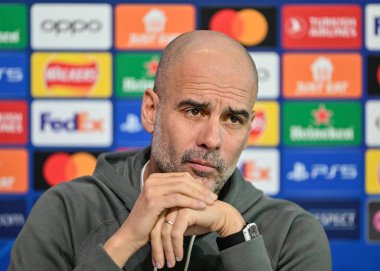 Pep Guardiola manager of Manchester City, during the Manchester City Champions League press Conference at Etihad Campus, Manchester, United Kingdom, 5th March 2024 clipart