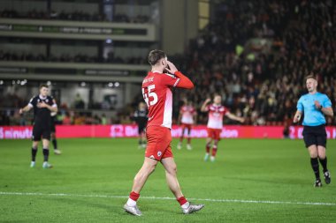 Barnsley 'den John Mcatee, 5 Mart 202' de Oakwell, Barnsley, İngiltere 'de oynanan 1. Gökyüzü İddia Ligi karşılaşmasında gol attıktan sonra tepki gösterdi.