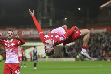 Barnsley 'den John Mcatee, 5 Mart 202' de Oakwell, Barnsley, Birleşik Krallık 'ta oynanan Sky Bet Lig 1 karşılaşmasında 1-0 kazanma hedefini kutluyor.