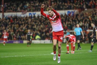 Barnsley 'den John Mcatee, 5 Mart 202' de Oakwell, Barnsley, Birleşik Krallık 'ta oynanan Sky Bet Lig 1 karşılaşmasında 1-0 kazanma hedefini kutluyor.