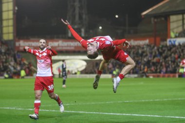 Barnsley 'den John Mcatee, 5 Mart 202' de Oakwell, Barnsley, Birleşik Krallık 'ta oynanan Sky Bet Lig 1 karşılaşmasında 1-0 kazanma hedefini kutluyor.