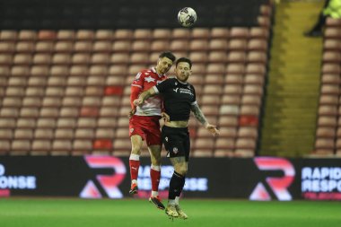 Barnsley 'den Jordan Williams, 5 Mart 202' de Oakwell, Barnsley, Birleşik Krallık 'ta oynanan Sky Bet 1 maçında Bolton Wanderers maçında yüksek topu kazandı.