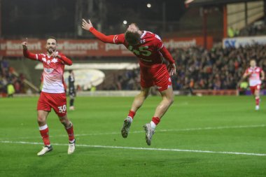 Barnsley 'den John Mcatee, 5 Mart 202' de Oakwell, Barnsley, Birleşik Krallık 'ta oynanan Sky Bet Lig 1 karşılaşmasında 1-0 kazanma hedefini kutluyor.
