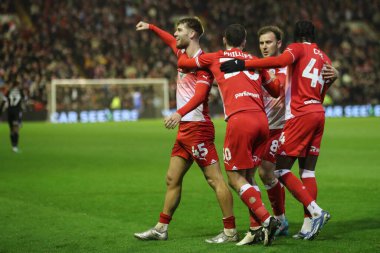Barnsley 'den John Mcatee, 5 Mart 202' de Oakwell, Barnsley, Birleşik Krallık 'ta oynanan Sky Bet Lig 1 karşılaşmasında 1-0 kazanma hedefini kutluyor.