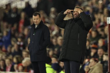 Bolton Wanderers 'ın teknik direktörü Ian Evatt, 5 Mart 202' de Oakwell, Barnsley 'de oynanan Sky Bet 1 karşılaşmasında teknik alanda tepki gösterdi.