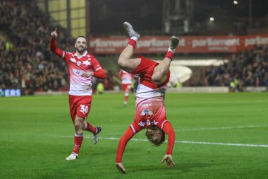 Barnsley 'den John Mcatee, 5 Mart 202' de Oakwell, Barnsley, Birleşik Krallık 'ta oynanan Sky Bet Lig 1 karşılaşmasında 1-0 kazanma hedefini kutluyor.