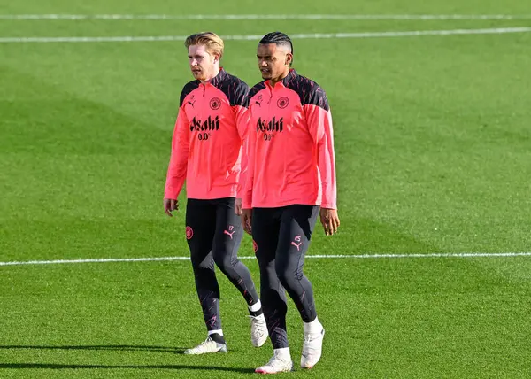 Stock image Kevin De Bruyne of Manchester City and Manuel Akanji of Manchester City, during the Manchester City open training Session at Etihad Campus, Manchester, United Kingdom, 5th March 2024