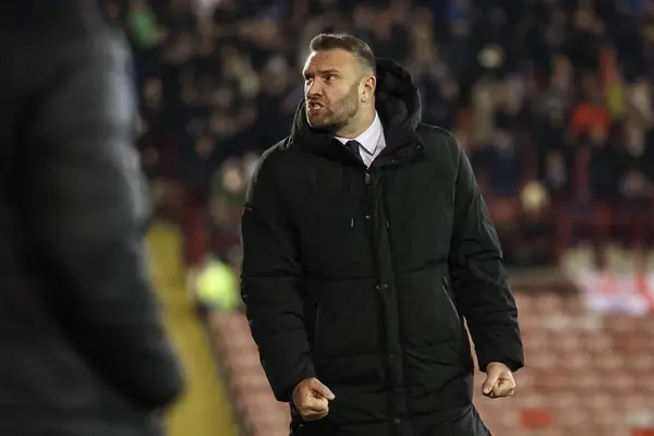 stock image Ian Evatt manager of Bolton Wanderers celebrates the goal of Victor Adeboyejo of Bolton Wanderers to make it 2-1 during the Sky Bet League 1 match Barnsley vs Bolton Wanderers at Oakwell, Barnsley, United Kingdom, 5th March 202