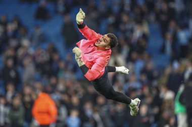 Manchester City 'den Ederson, UEFA Şampiyonlar Ligi karşılaşmasında maç öncesi ısınma oturumunda Manchester City ile F.C. Kopenhag Etihad Stadyumu, Manchester, İngiltere, 6 Mart 202