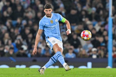 Manchester City 'den Rben Dias UEFA Şampiyonlar Ligi maçında pas veriyor. Manchester City ile F.C. Kopenhag Etihad Stadyumu, Manchester, İngiltere, 6 Mart 2024