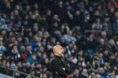 Manchester City 'nin Pep Guardiola teknik direktörü takımına UEFA Şampiyonlar Ligi maçında Manchester City ile F.C. Kopenhag Etihad Stadyumu, Manchester, İngiltere, 6 Mart 202