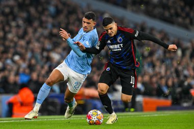 Manchester City 'den Matheus Nunes ve FC Kopenhag' dan Muhammed Elyounoussi Manchester City ile F.C. Kopenhag Etihad Stadyumu, Manchester, İngiltere, 6 Mart 202