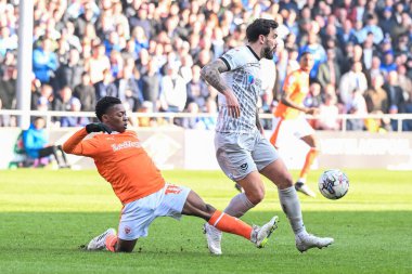 Blackpool 'dan Karamoko Dembele, 9 Mart 202' de Bloomfield Road, Blackpool 'da oynanan Sky Bet 1 karşılaşmasında Portsmouth Marlon Pack tarafından yenildi.