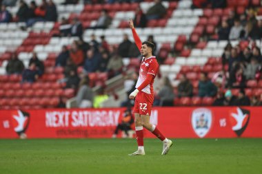Barnsley 'den Corey O' Keeffe takımına 9 Mart 202 'de Oakwell, Barnsley' de Barnsley 'e karşı Lincoln City maçında talimat veriyor.