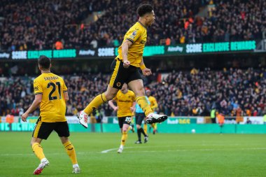 Wolverhampton Wanderers takımından Joo Gomes, 9 Mart 2024 'te Wolverhampton Wanderers ile Fulham arasında oynanan Premier League maçında 2-0' lık galibiyet golünü kutluyor.